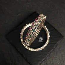 Handcrafted multi stone bangles in 92.5 sterling silver. With green and maroon coloured stone, perfect for everyday wear. You can stack them or wear them alone. 
