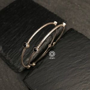 Handcrafted Summer Love bangles in 92.5 sterling silver with black stones. Perfect everyday wear you can stack them or wear them alone. 
