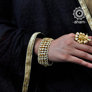 Handcrafted festive silver bracelet with gold polish, kundan work and embellished cultured pearls.
