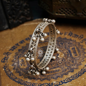 Handcrafted vintage silver bangles with statement ghungroos.  