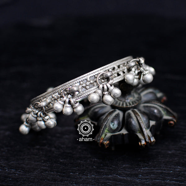 Handcrafted tribal silver bangles with statement ghungroos.  