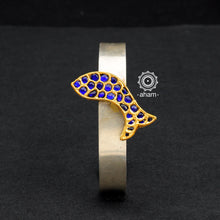 One of a kind statement wearable art pieces. An eclectic mix of elements, with a play of colours, textures, forms and workmanship. Crafted in 92.5 Sterling Silver with two tones that make them so versatile and unique. Modern Heirloom pieces that can be worn across generations.   The price is for one piece kada only. 