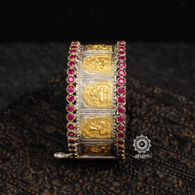 Two tone Ganesha silver kada with maroon kemp highlights. The price is for one piece kada only. 