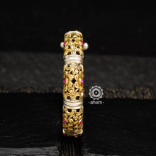 Noori two tone hand kada handcrafted in 92.5 sterling silver with intricate floral Chitai carving work. The beauty of two tone jewellery pieces is that they are so versatile, they can be clubbed and styled with so many outfits, including your Indian and Western wear.
