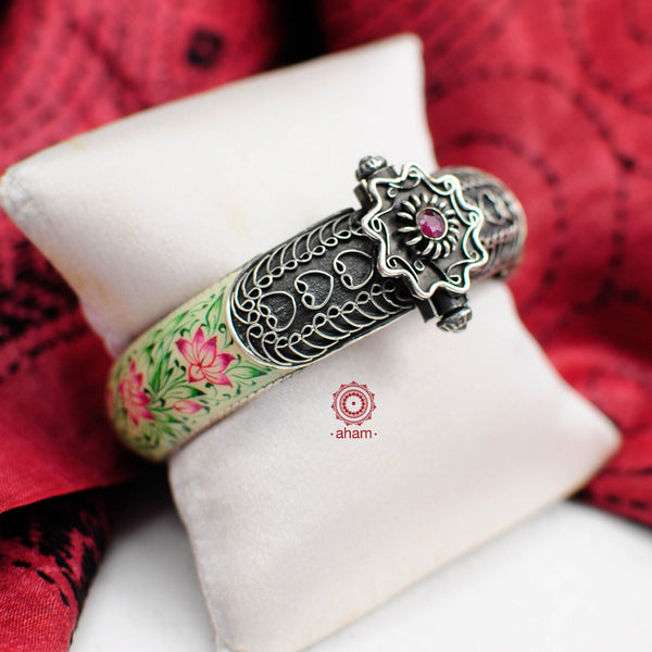 Beautiful 92.5 sterling silver kada with Meenakari work. Miniature floral hand painting done by skilful artisans. These elegant kadas are a must have in any jewellery lovers collection. 