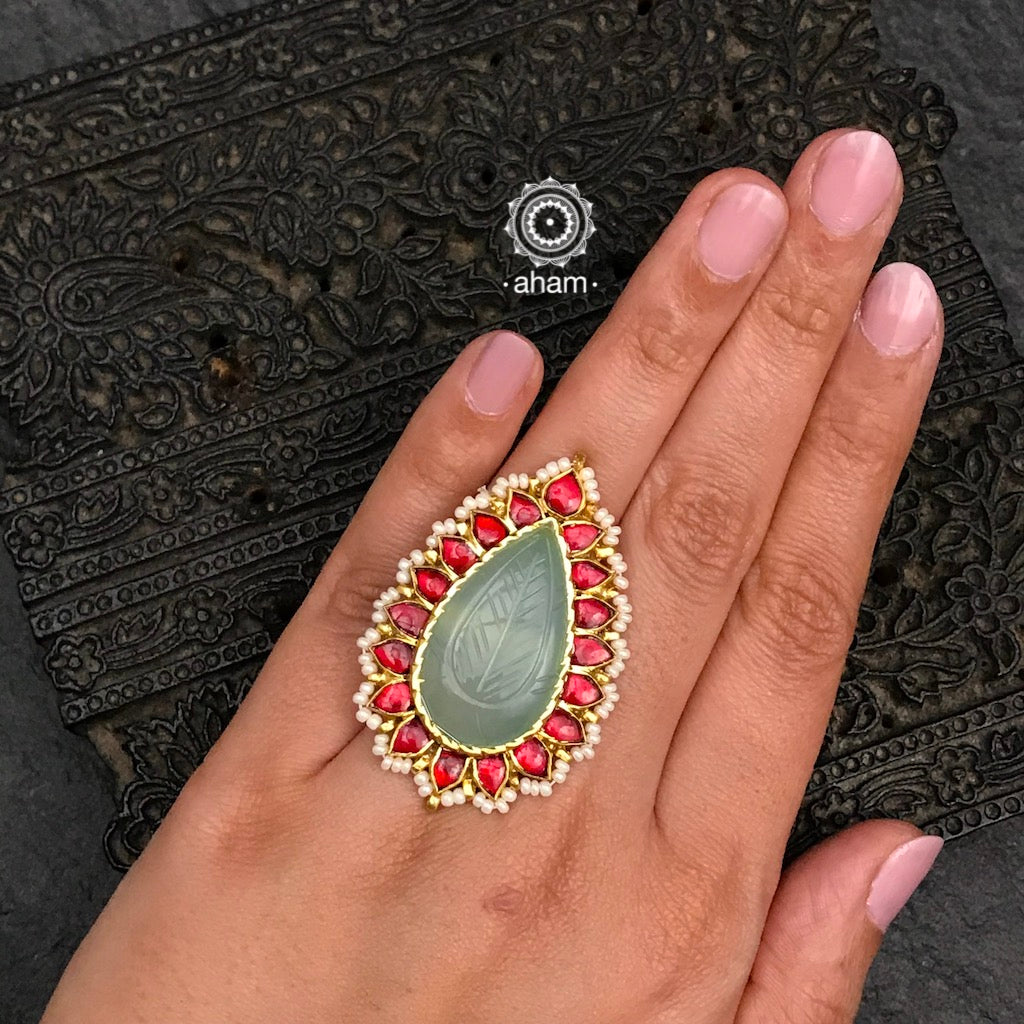 Gold polish green semi precious stone drop ring with maroon stone setting. Beautiful and wearable adjustable ring crafted in 92.5 sterling silver with cultured pearls. Perfect for special occasions and festivities. 