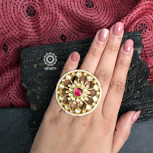 Festive gold polish adjustable ring kundan work. Handcrafted in 92.5 sterling silver with elegant geometric designs including rani (pink) coloured stone. Perfect for special occasions and festivities. 