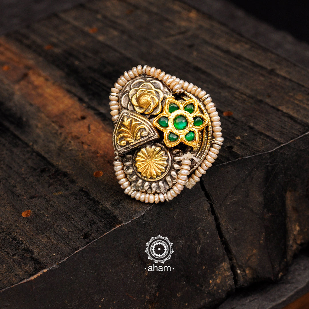 One of a kind statement wearable art pieces. Adjustable ring crafted in 92.5 sterling silver with green spinel, floral motif, gold polish, embellished cultured pearls.