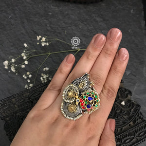Noori two tone adjustable ring with an elegant peacock motif. Handcrafted in 92.5 sterling silver with floral motif, semi precious stones and cultured pearls.