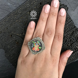 Silver Ring with an intricate hand painted Krishna Motif in vibrant colours. 