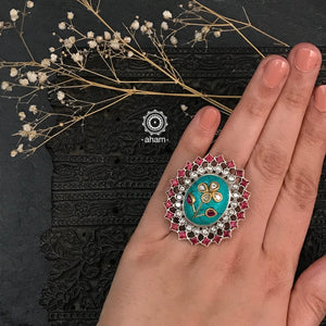 Ira adjustable ring, handcrafted intricately in 92.5 sterling silver with kundan inlay work on Turquoise coloured stone. Perfect for special occasions and festivities.