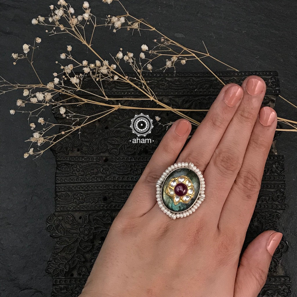 Beautiful stone ring set in 92.5 sterling silver with kundan inlay work and pearl highlight. Perfect for special occasions and festivities.