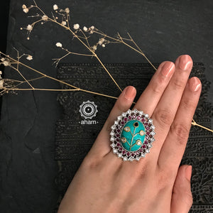 Ira adjustable ring, handcrafted intricately in 92.5 sterling silver with semi precious stone and Kundan work. Perfect for special occasions and festivities.