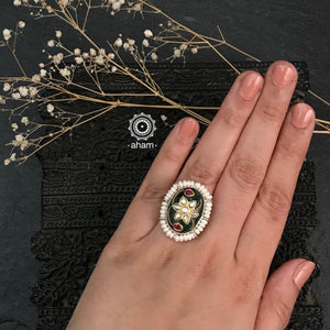Ira adjustable stone ring, handcrafted intricately in 92.5 sterling silver with Kundan inlay work and pearl highlights.  Perfect for special occasions and festivities. 
