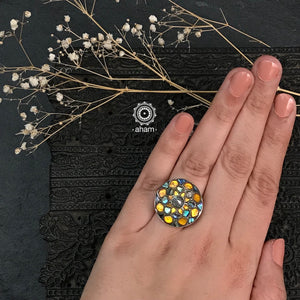 Blooming flower ring in subtle colours crafted in 92.5 silver.  Perfect companion on a night out with friends and loved ones. 