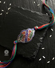 Easy to tie,  Elegant Floral motif in 925 sterling silver rakhi for your brother weaved in Multi Colour cotton thread . Traditional Handcrafted 925 Silver rakhi. Also avaialble  Rakhi made with Ganapati, Trishul  and Om symbol. Starting with Rs.  551,  wide range of silver rakhi , 50+ rakhi designs. Gift for Sister. worldwide Shipping. Buy 925  Sterling Silver Rakhi Collection Online India.  Shop Now.