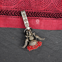 Handcrafted 92.5 sterling silver key chain with Ganesha motif, elegant peacock motif and coral stones dangling to a chitai work jhumka. Also known as Challah, Juda, Chatka and Guchha.