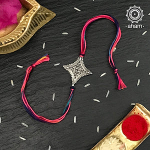 Easy to tie,  Elegant Diamond Rakhi in 925 sterling silver for your brother weaved in Multi Colour cotton thread . Traditional Handcrafted 925 Silver rakhi. Also avaialble  Rakhi made with Ganapati, Trishul  and Om symbol. Starting with Rs.  551,  wide range of silver rakhi , 50+ rakhi designs. Gift for Sister. worldwide Shipping. Buy 925  Sterling Silver Rakhi Collection Online India.  Shop Now.