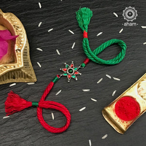 Easy to tie,  Elegant Floral motif in 925 sterling silver rakhi for your brother weaved in red and Green Colour cotton thread . Traditional Handcrafted 925 Silver rakhi. Also avaialble  Rakhi made with Ganapati, Trishul  and Om symbol. Starting with Rs.  551,  wide range of silver rakhi , 50+ rakhi designs. Gift for Sister. worldwide Shipping. Buy 925  Sterling Silver Rakhi Collection Online India.  Shop Now.