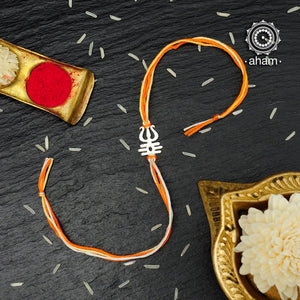 Easy to tie,  Elegant Trishul Rakhi in 925 Silver for your brother weaved in Orange Colour cotton thread . Traditional Handcrafted 925 Silver rakhi. Also avaialble  Rakhi made with Ganapati and Om symbol. Starting with Rs.  551,  wide range of silver rakhi , 50+ rakhi designs. Gift for Sister. worldwide Shipping. Buy 925  Sterling Silver Rakhi Collection Online India.  Shop Now.