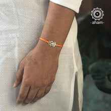 Easy to tie, Elegant Trishul Rakhi in 925 Silver for your brother weaved in Orange Colour cotton thread . Traditional Handcrafted 925 Silver rakhi. Also avaialble Rakhi made with Ganapati and Om symbol. Starting with Rs. 551, wide range of silver rakhi , 50+ rakhi designs. Gift for Sister. worldwide Shipping. Buy 925 Sterling Silver Rakhi Collection Online India. Shop Now.
