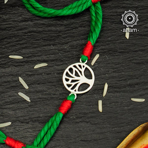 Beautiful Silver Rakhi, Make this Rakshabandhan Memorable with this handcrafted Rakhi  Silver dial weaved with cotton thread for an ever-lasting Knot.  Tip: you can later convert this into a key chain charm or a pendant as well