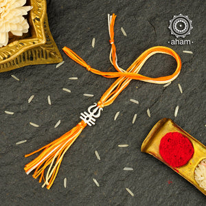 Easy to tie,  Elegant Trishul Symbol in 925 sterling silver lumba rakhi for Bhabhi, weaved in orange and yellow colour cotton thread . Traditional Handcrafted 925 Silver lumba  rakhi. Also avaialble  Rakhi made with Ganapati and Om symbols. Starting at Rs. 551,  wide range of silver rakhi , 50+ rakhi designs. Gift for Sister. worldwide Shipping. Buy 925 Silver Rakhi Collection Online India.  Shop Now.