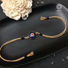 Make this Rakshabandhan Memorable with this handcrafted silver Rakhi. Elegant Lapiz Stone Rakhi in 925 Silver with Gold Polish and beautiful inlay work. 