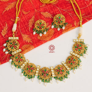 Traditional Jewellery perfect for family weddings.  Beautiful antique finish neckpiece set intricately embedded in the  lustre of precious coloured stones. A stunning addition to your wedding look.  The beautiful workmanship is something that can be cherished and passed on for generations to come. 