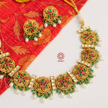 Traditional Jewellery perfect for family weddings.  Beautiful antique finish neckpiece set intricately embedded in the  lustre of precious coloured stones. A stunning addition to your wedding look.  The beautiful workmanship is something that can be cherished and passed on for generations to come. 