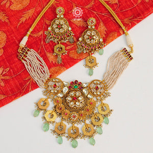 Traditional Jewellery perfect for family weddings.  Beautiful antique finish neckpiece set intricately embedded in the  lustre of precious coloured stones and pearls. A stunning addition to your wedding look.  The beautiful workmanship is something that can be cherished and passed on for generations to come. 