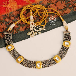 Make a sophisticated style statement with this Noori two tone choker and earrings set. Handcrafted using traditional techniques in 92.5 sterling silver with kundan work. Perfect for intimate weddings and upcoming festive celebrations.