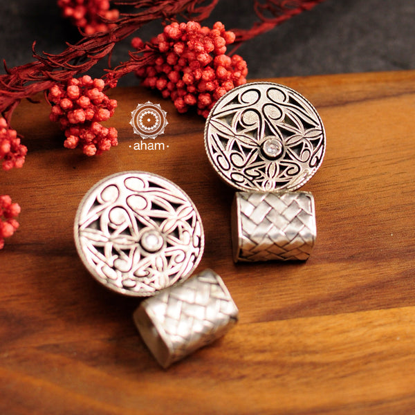 Contemporary earrings handcrafted in 92.5 sterling silver with intricate floral patterns. These earrings look elegant paired with any outfit from Dawn to Dusk.
