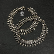 Dress your feet with these bold and beautiful statement paisley anklets. Crafted in 92.5 sterling silver created with traditional artistry. Pair it with your slip maxi or embroidered anarkali, rajasthani jootis, and a potli bag to complete your look