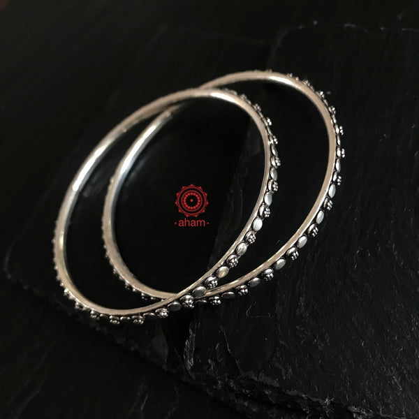 Everyday wear Bangles crafted in 92.5 sterling silver. Comes as a set of two bangles. 