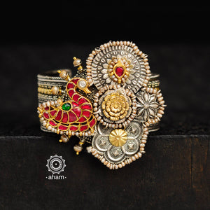 Noori two tone silver open hand cuff with a vibrant swan motif. An eclectic mix of elements, with a play of colours, textures, forms and workmanship. Handcrafted in 92.5 Sterling Silver with two tones that make them so versatile and unique. Modern Heirloom pieces that can be worn across generations. 