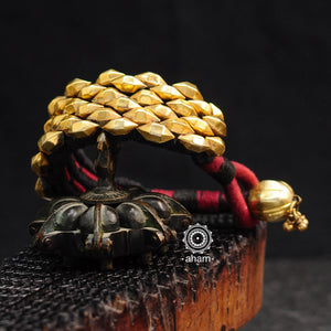 Tribal gold polish pauchi with silver bead work, handcrafted by skilful artisans. Beautiful kada from a bygone era, that bring back memories and stories of that time. Please note we have not changed the threading of this vintage pauchi. 