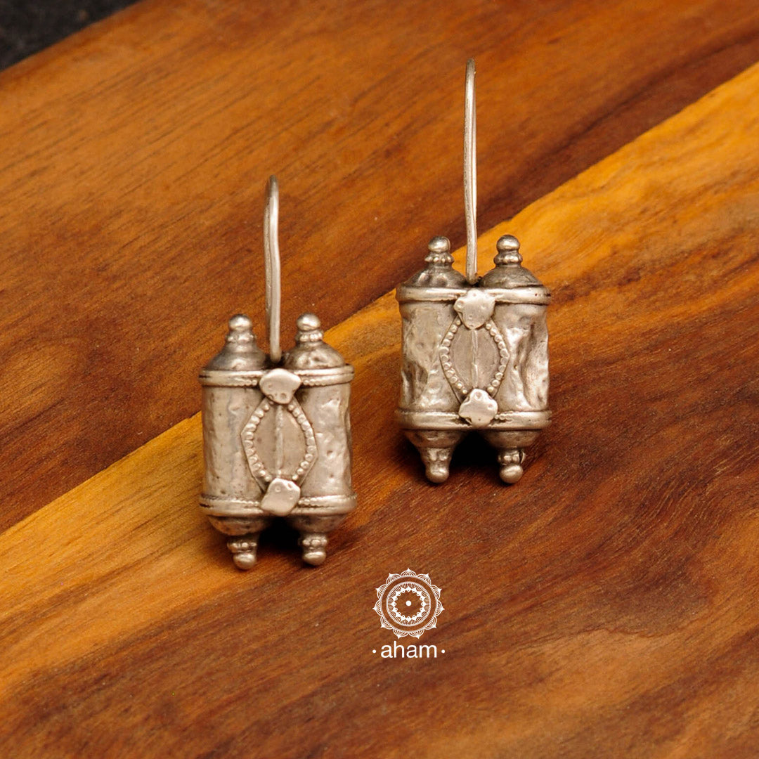 There is a different charm to old world pieces.  so unique, so beautiful, heirloom pieces.  Tribal silver earrings that will make a beautiful edition to your collection. Please note since these are made from assorted old pieces, there might be some minor variations between the two pieces. 
